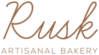 Rusk Artisanal Bakery logo